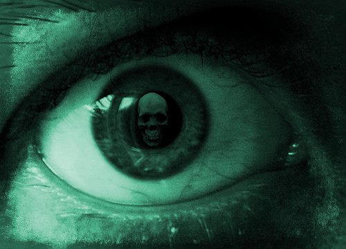 skull reflected in cornea