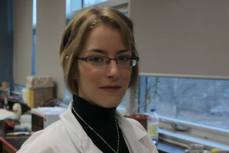 Lindsey Carmichael wearing a lab coat